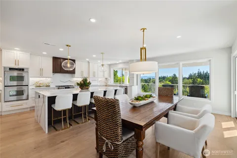 a view of a dining room with furniture window and outside view