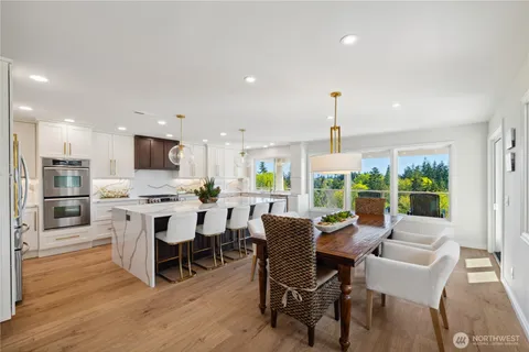 a view of a dining room with furniture window and outside view