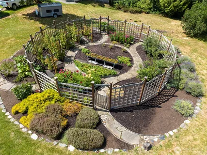 a garden view with a seating space