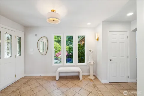 a living room with a furniture and a window
