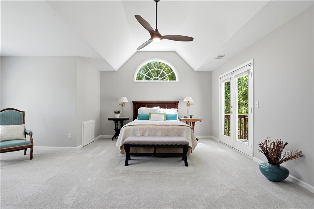 3660 Chartwell Drive Suwanee, GA 30024 - Photo 14 of 50 a bedroom with a bed and a window