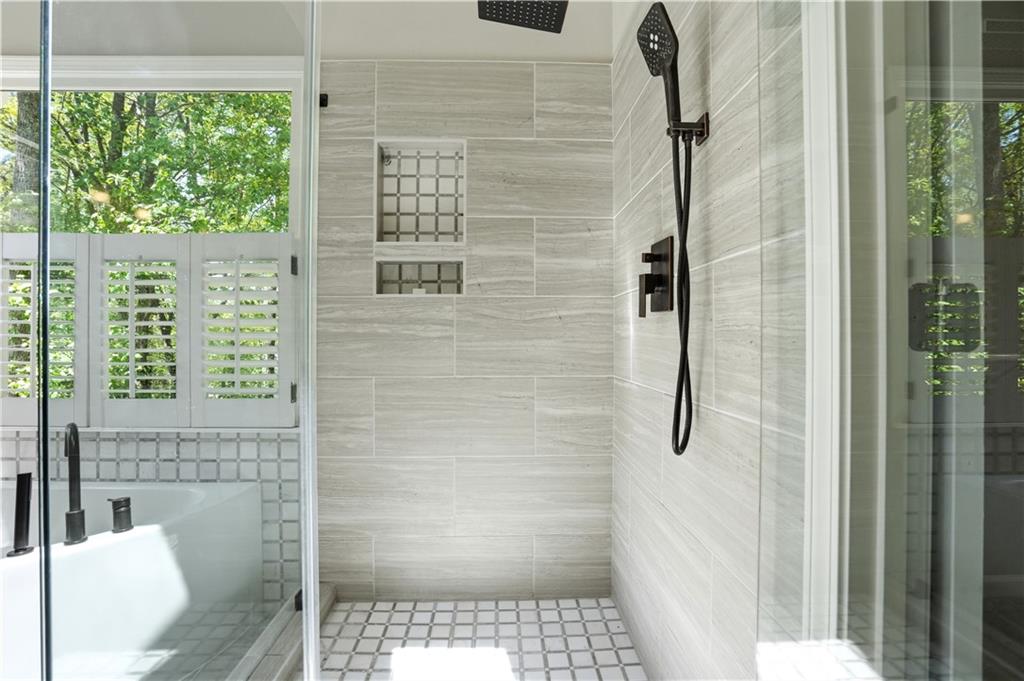 3660 Chartwell Drive Suwanee, GA 30024 - Photo 22 of 50 a bathroom with a shower