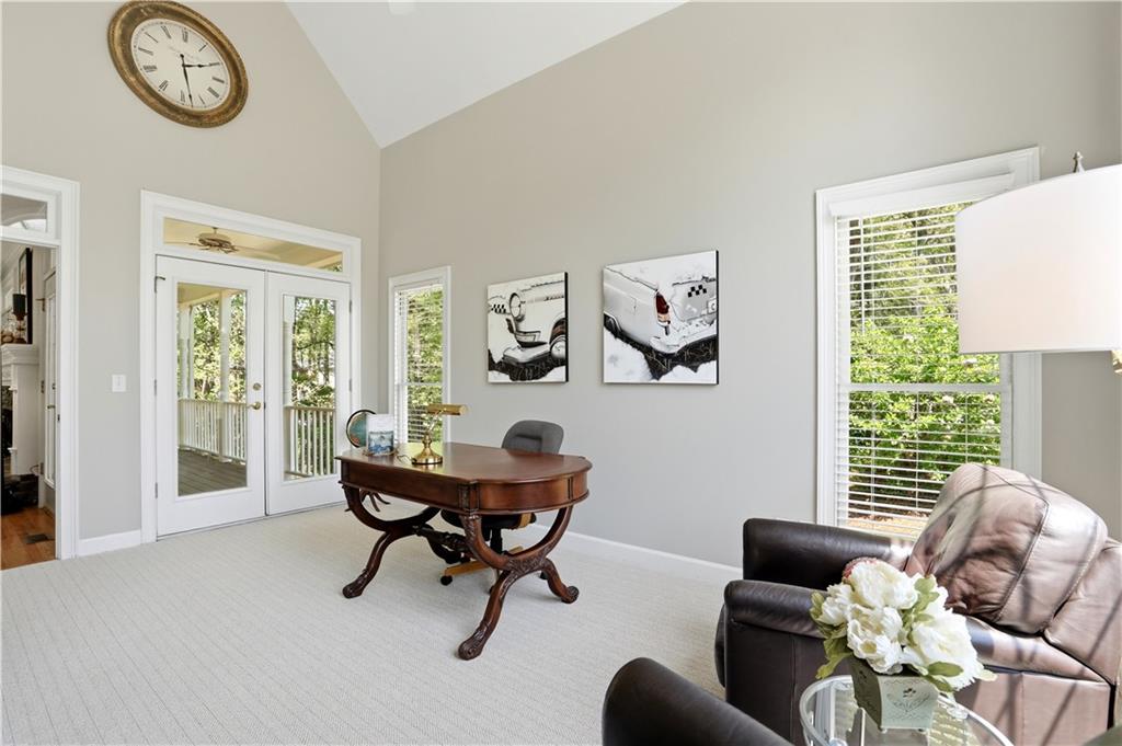 3660 Chartwell Drive Suwanee, GA 30024 - Photo 23 of 50 a living room with furniture and a window