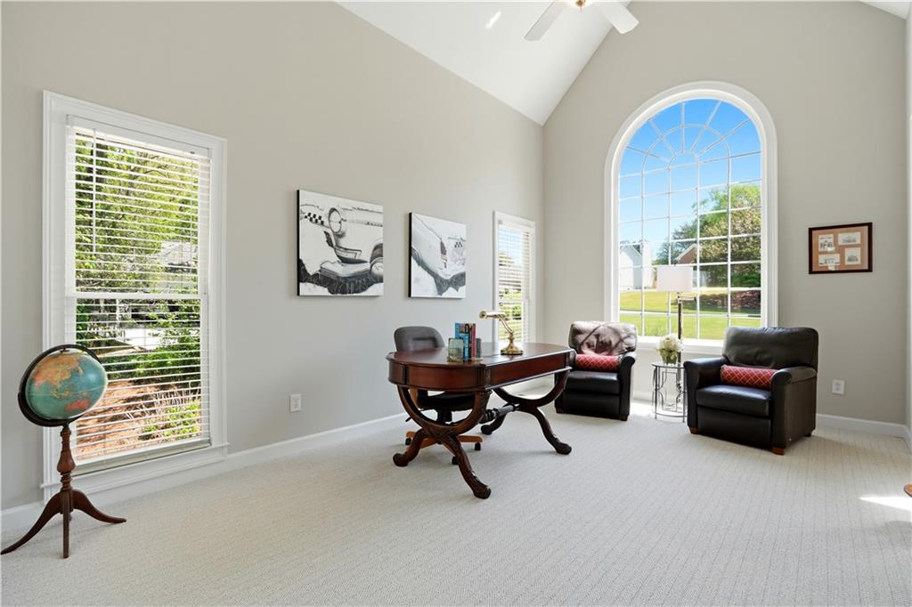 3660 Chartwell Drive Suwanee, GA 30024 - Photo 24 of 50 a living room with furniture and a window
