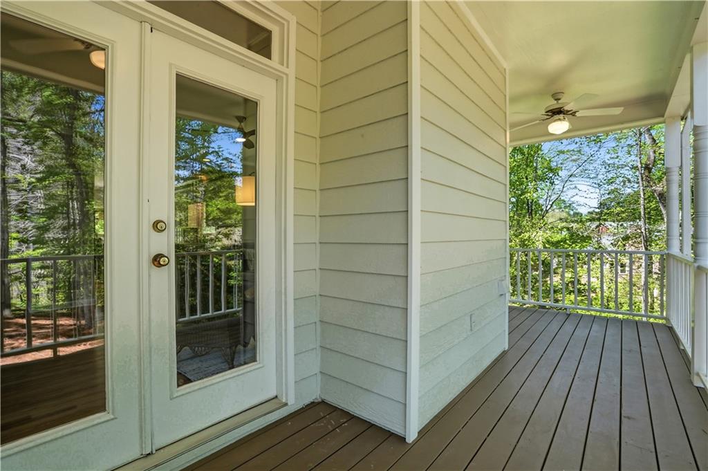 3660 Chartwell Drive Suwanee, GA 30024 - Photo 40 of 50 a view of a glass door with wooden floor