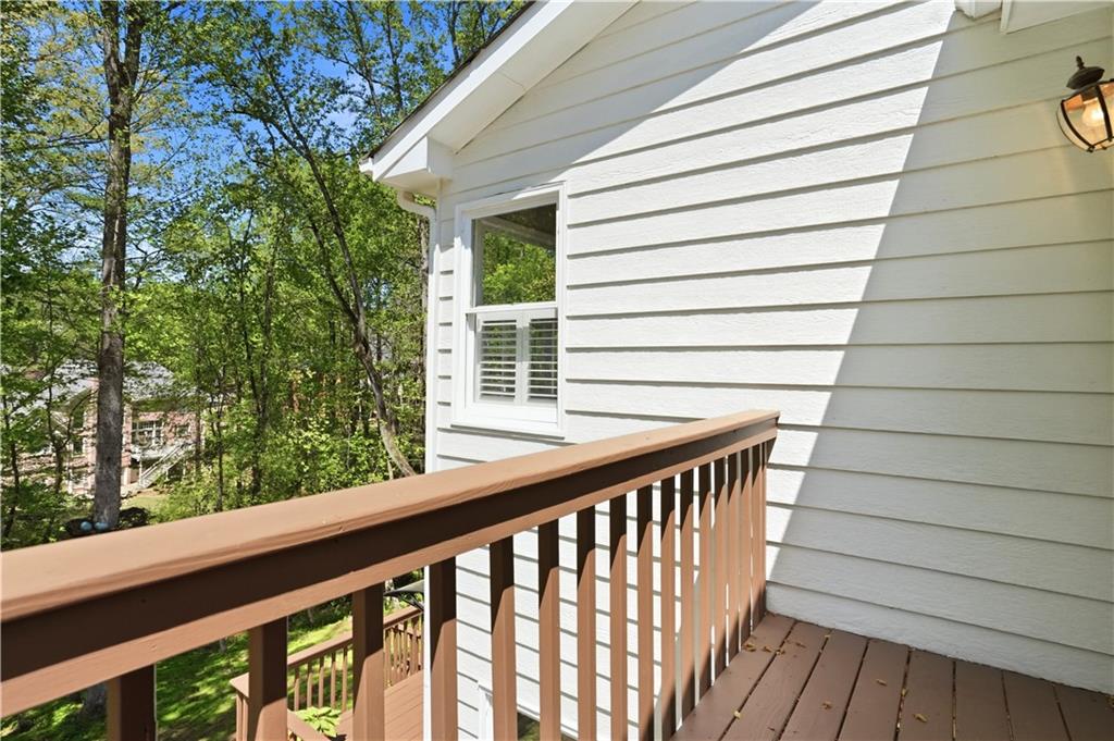 3660 Chartwell Drive Suwanee, GA 30024 - Photo 41 of 50 a view of balcony with wooden floor