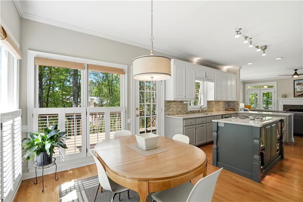 3660 Chartwell Drive Suwanee, GA 30024 - Photo 10 of 50 a kitchen with a table and chairs