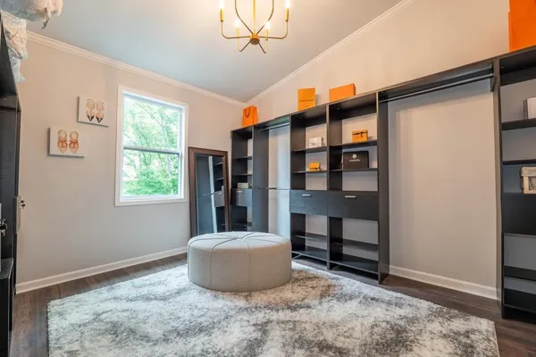 a bathroom with a shower and a sink
