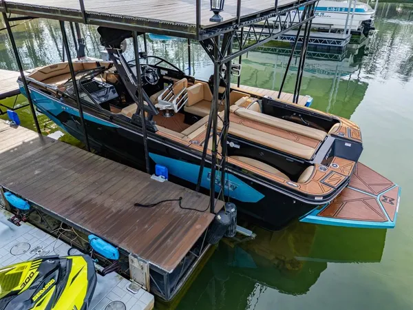 a view of a backyard with sitting area
