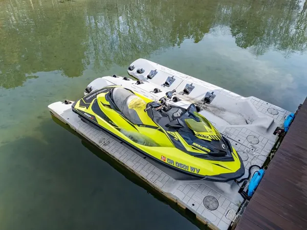 a wooden floor with swimming pool in front of it