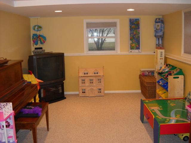651 Wellner Road Naperville, IL 60540 - Photo 8 of 16 a room with toys and a shelf