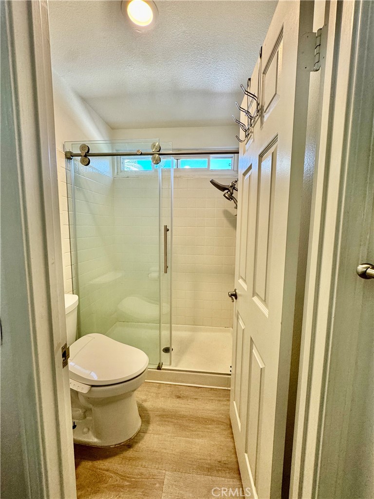 3 White Birch Irvine, CA 92604 - Photo 19 of 22 a bathroom that has a toilet and a shower