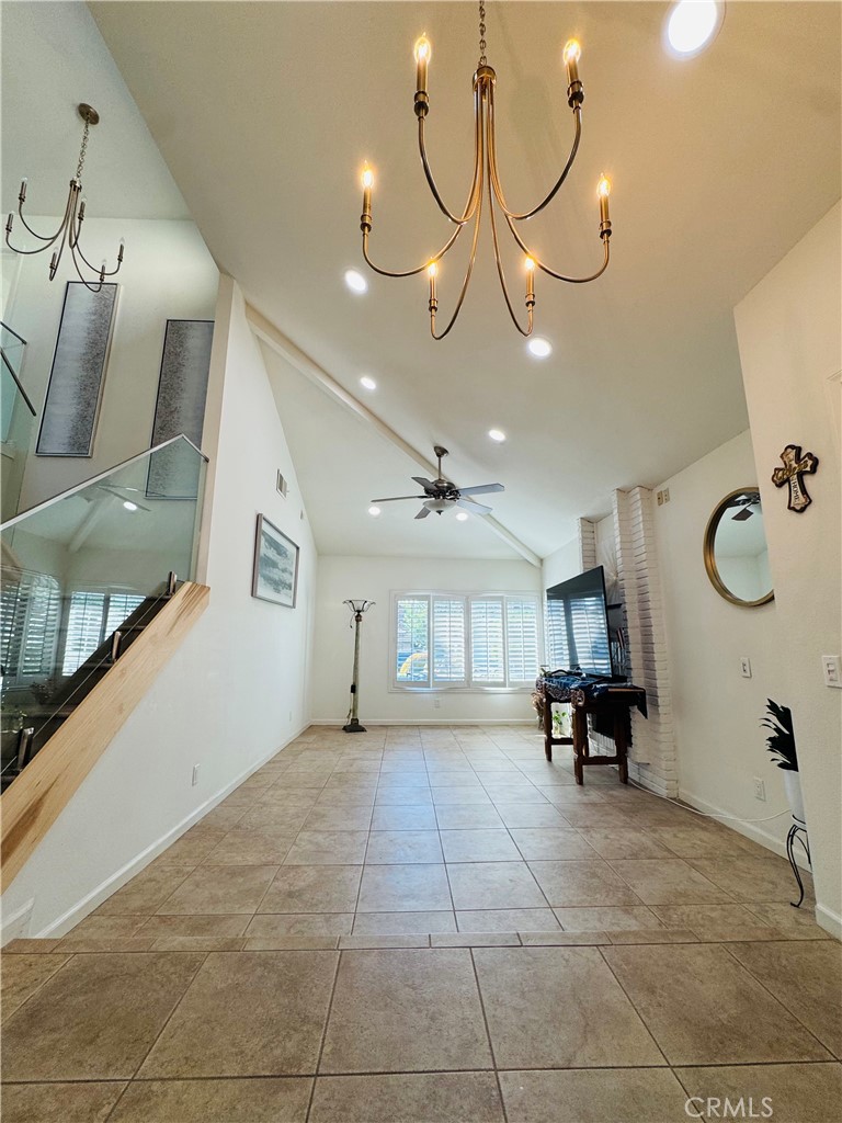 3 White Birch Irvine, CA 92604 - Photo 3 of 22 a view of a room with furniture and a chandelier