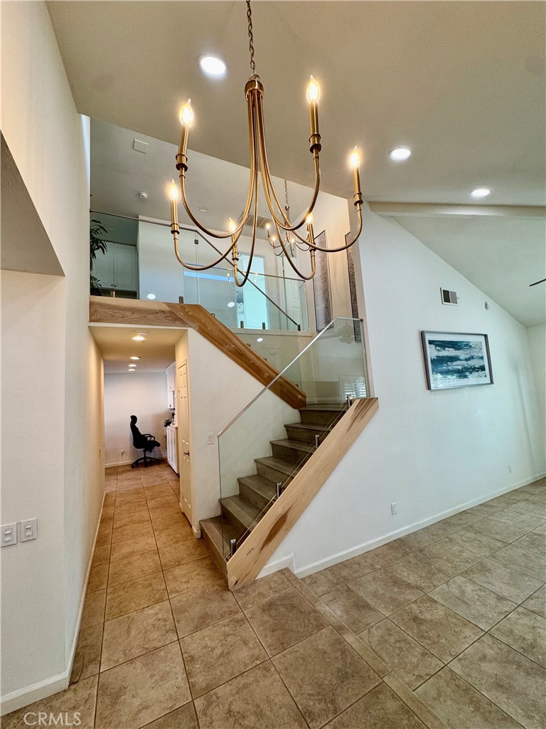 3 White Birch Irvine, CA 92604 - Photo 9 of 22 a view of a livingroom with stairs and an furniture