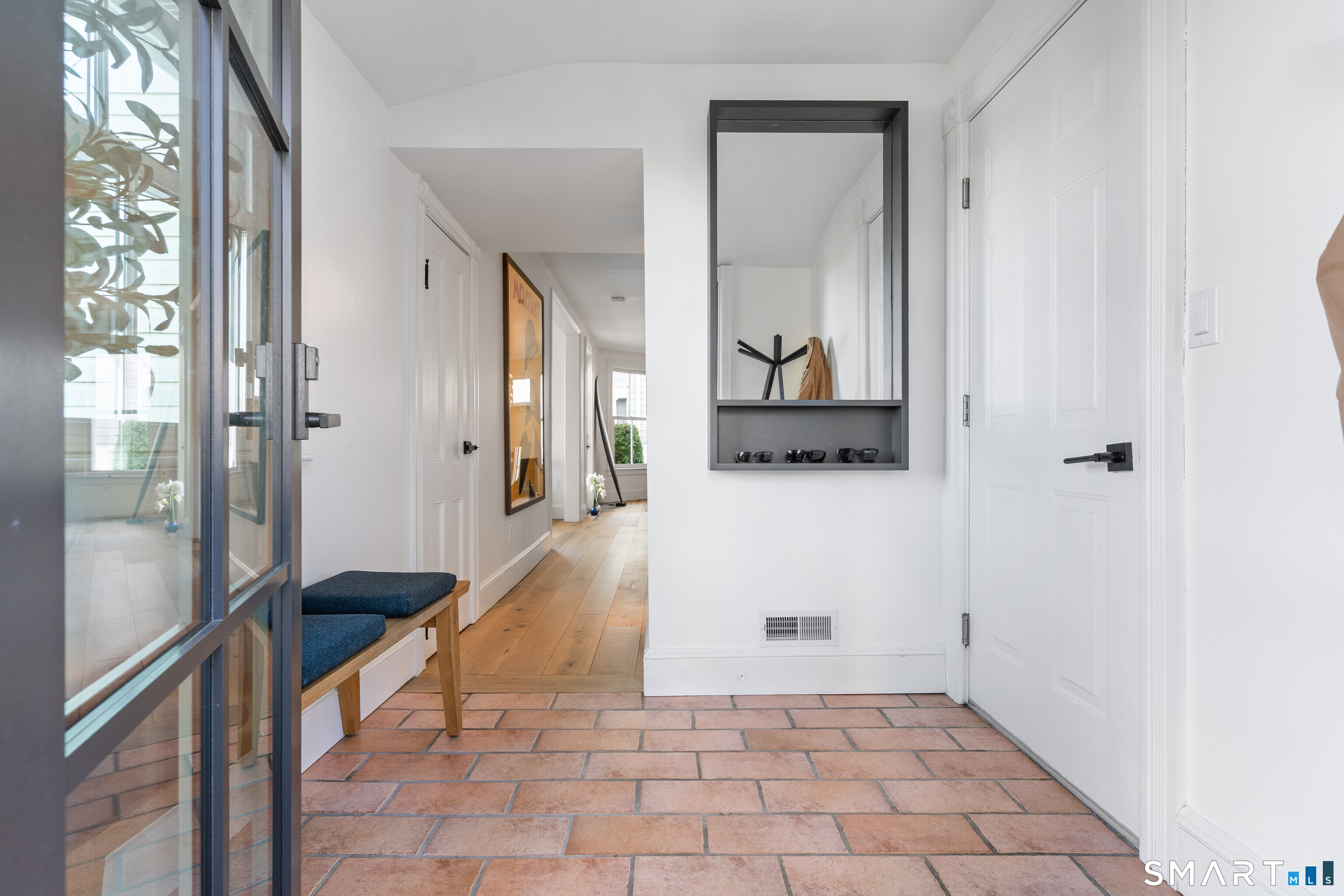 22 Ensign Road Norwalk, CT 06853 - Photo 14 of 39 a hallway with a view of living room
