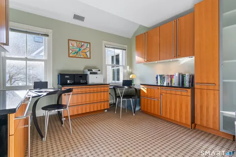 a hallway with cabinets