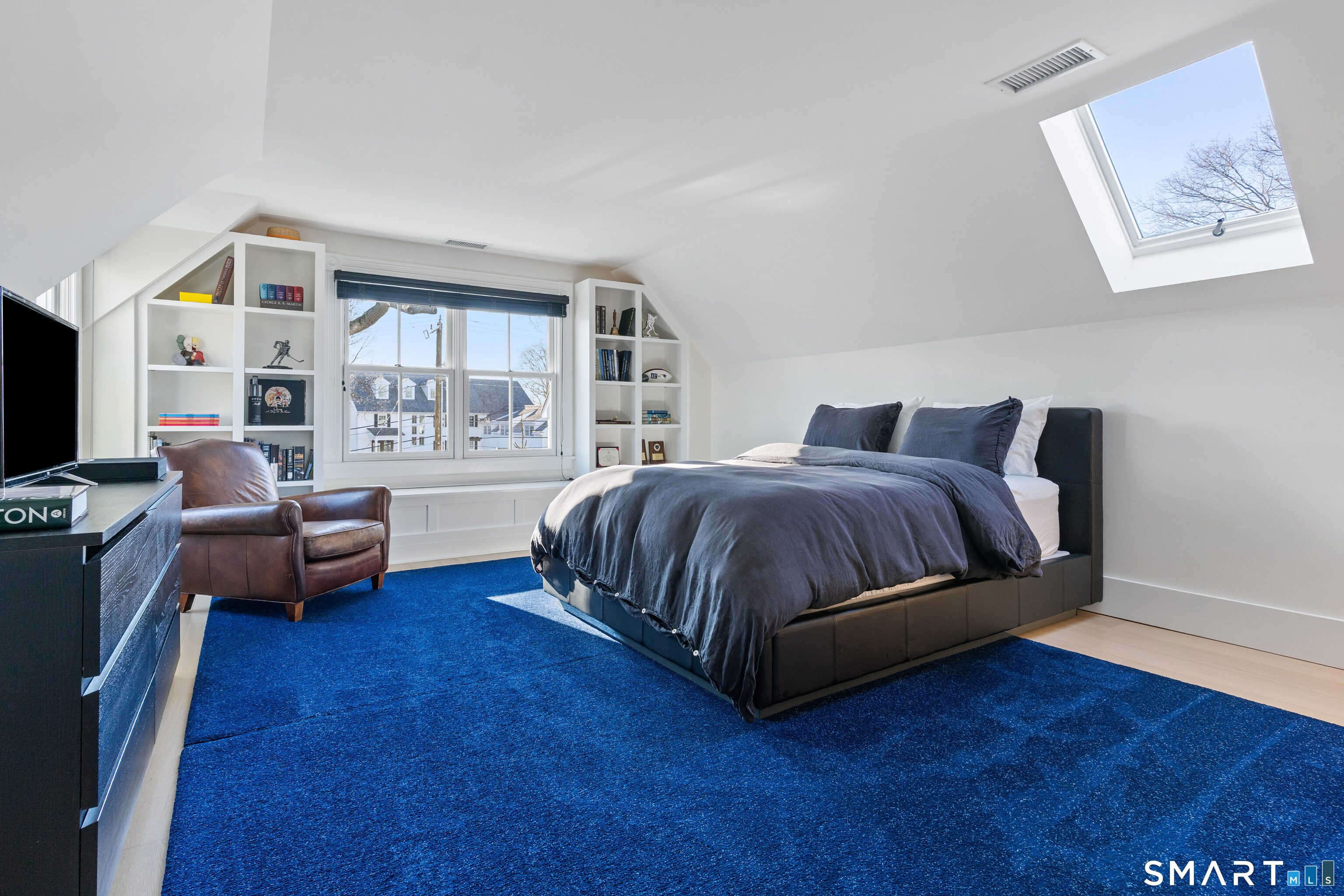 22 Ensign Road Norwalk, CT 06853 - Photo 29 of 39 a bedroom with a bed and a couch