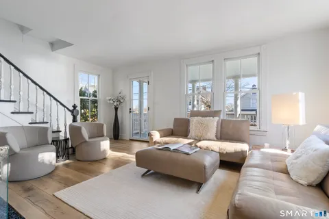 a kitchen with a sink cabinets and window