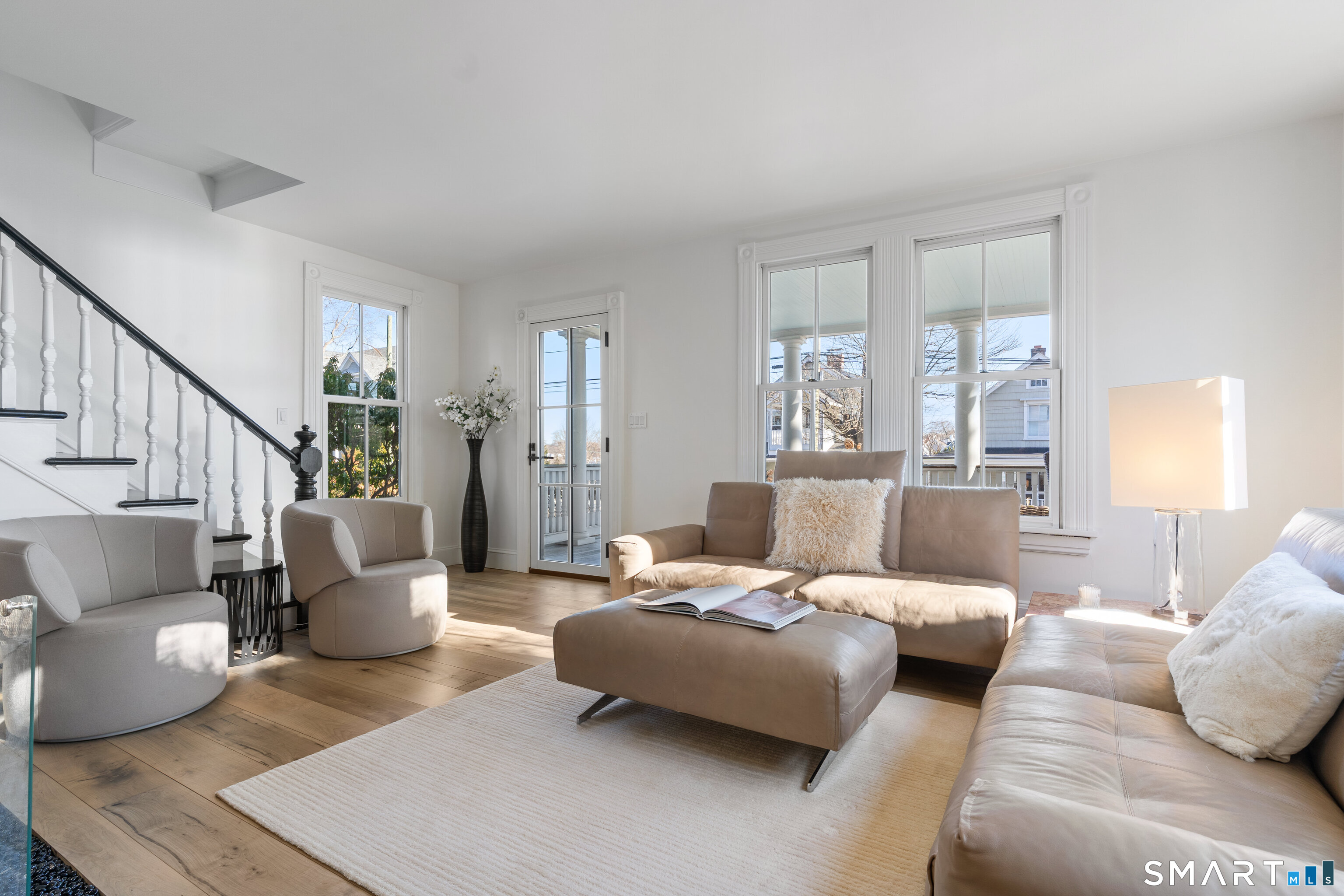 22 Ensign Road Norwalk, CT 06853 - Photo 7 of 39 a living room with furniture and a large window