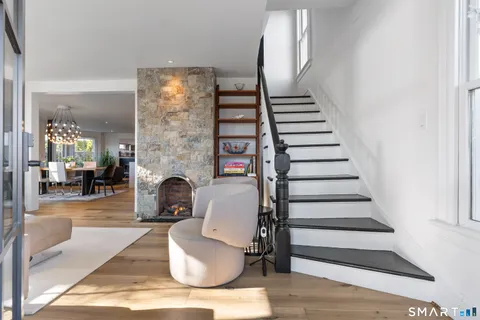 a kitchen with a sink stainless steel appliances and cabinets