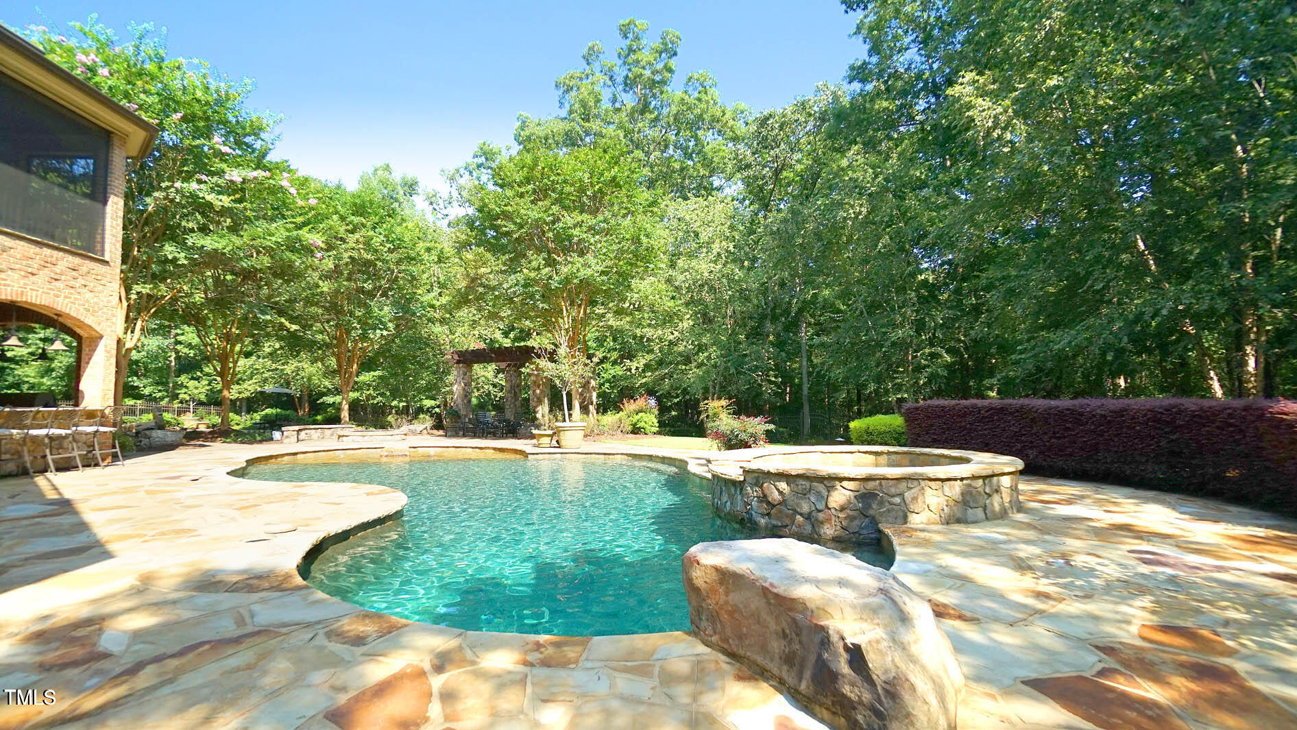 15508 Possum Track Road Raleigh, NC 27614 - Photo 12 of 85 a view of a swimming pool with an outdoor space