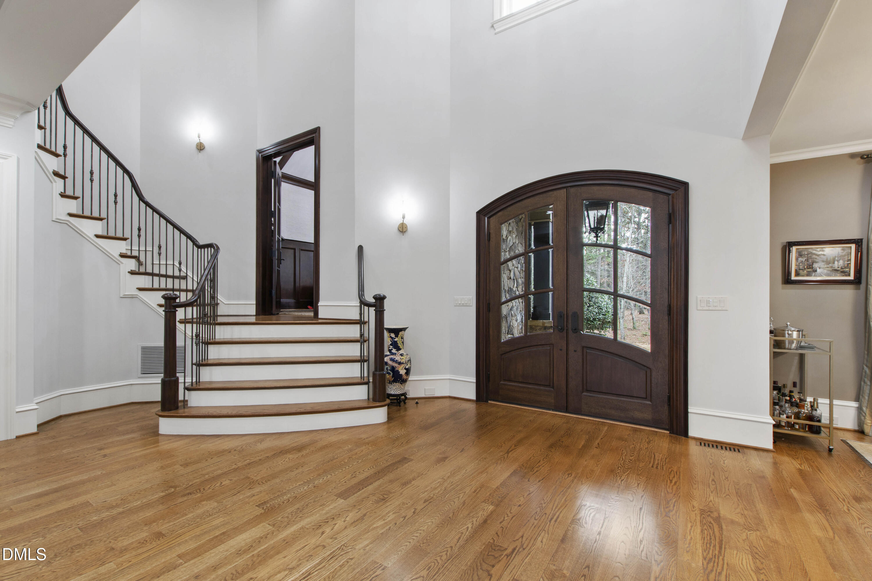 15508 Possum Track Road Raleigh, NC 27614 - Photo 19 of 85 a view of entryway and hall with wooden floor