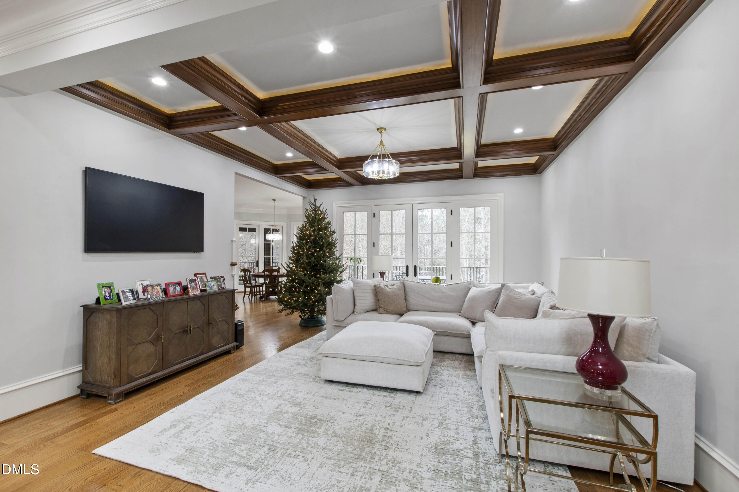 15508 Possum Track Road Raleigh, NC 27614 - Photo 22 of 85 a living room with furniture and a flat screen tv
