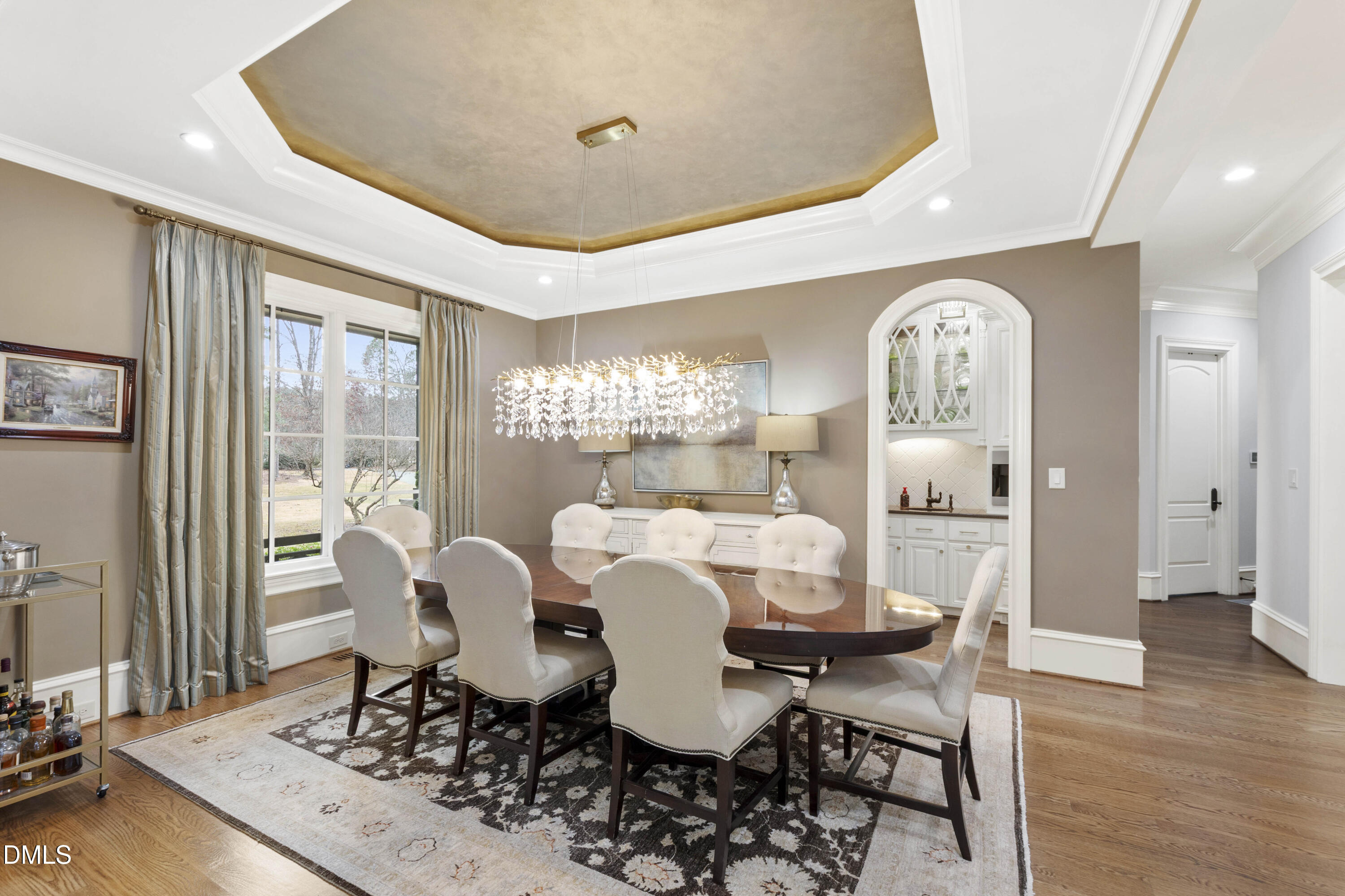 15508 Possum Track Road Raleigh, NC 27614 - Photo 24 of 85 a view of a dining room with furniture window and wooden floor
