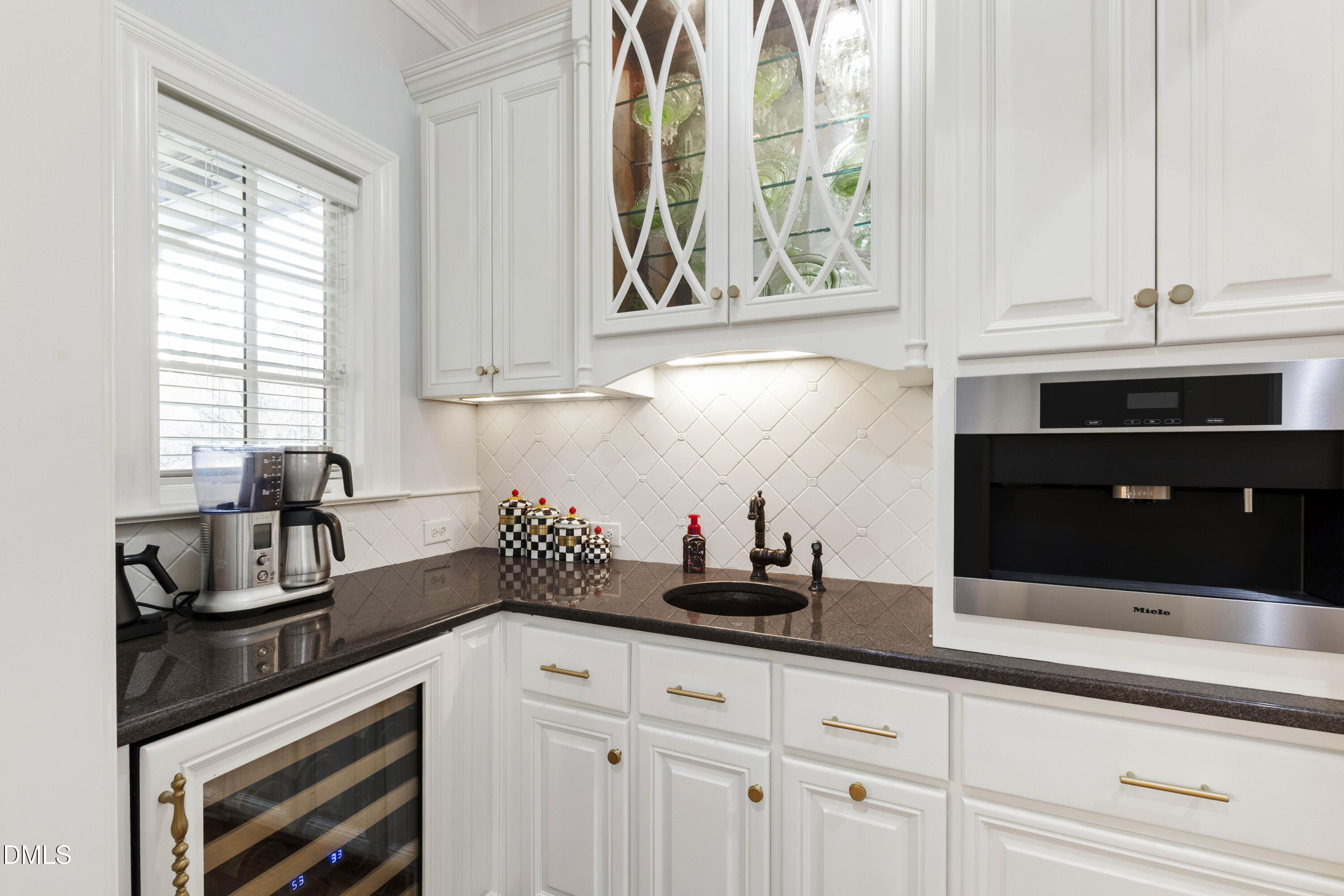 15508 Possum Track Road Raleigh, NC 27614 - Photo 26 of 85 a kitchen with stainless steel appliances white cabinets and a sink