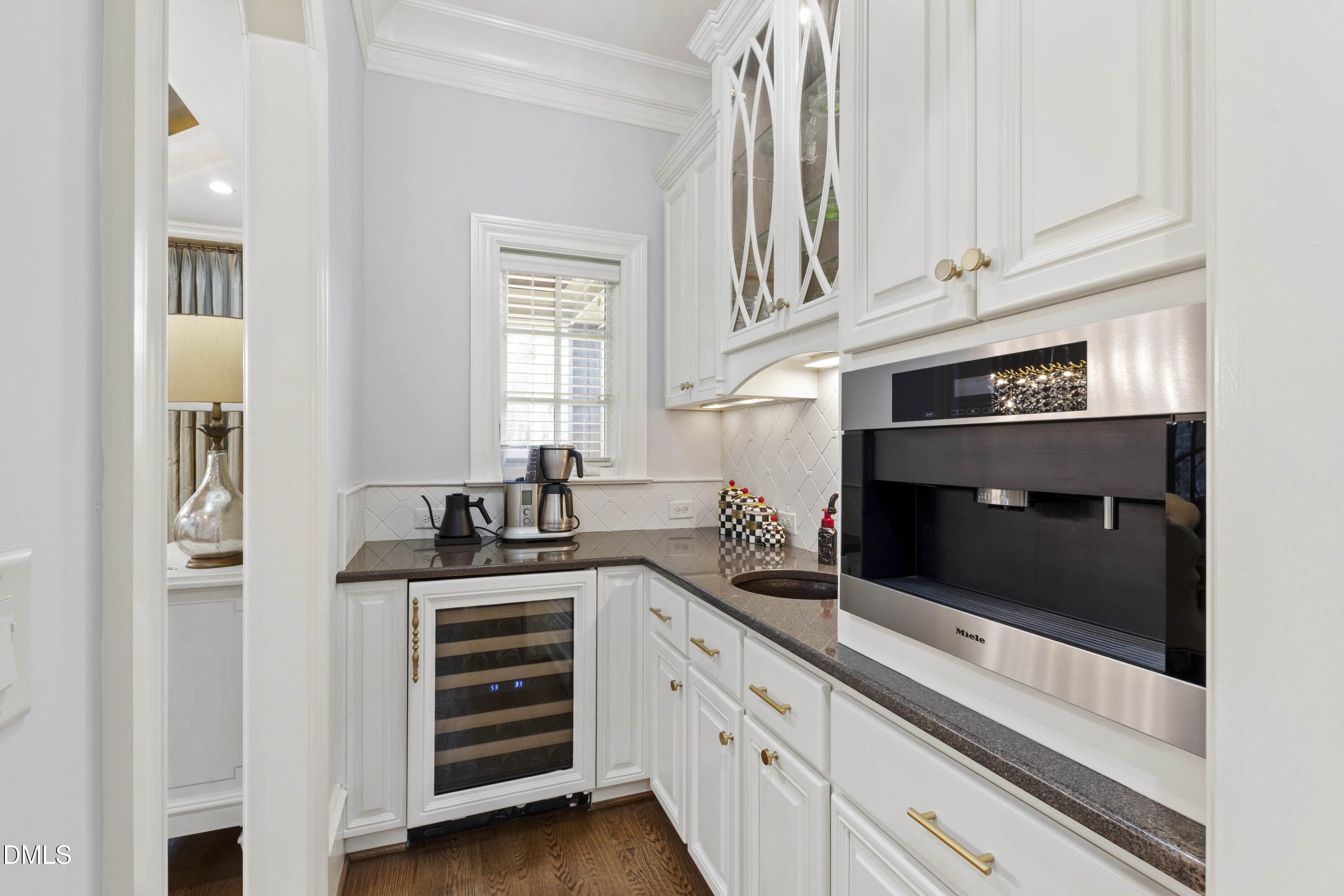 15508 Possum Track Road Raleigh, NC 27614 - Photo 27 of 85 a kitchen with stainless steel appliances granite countertop white cabinets and a sink
