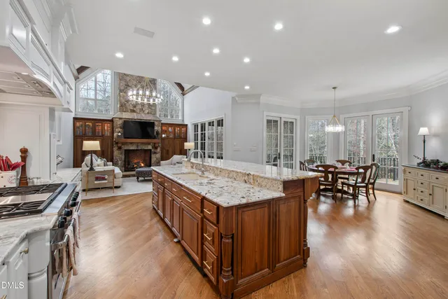 a bath tub sitting in a bathroom next to a window