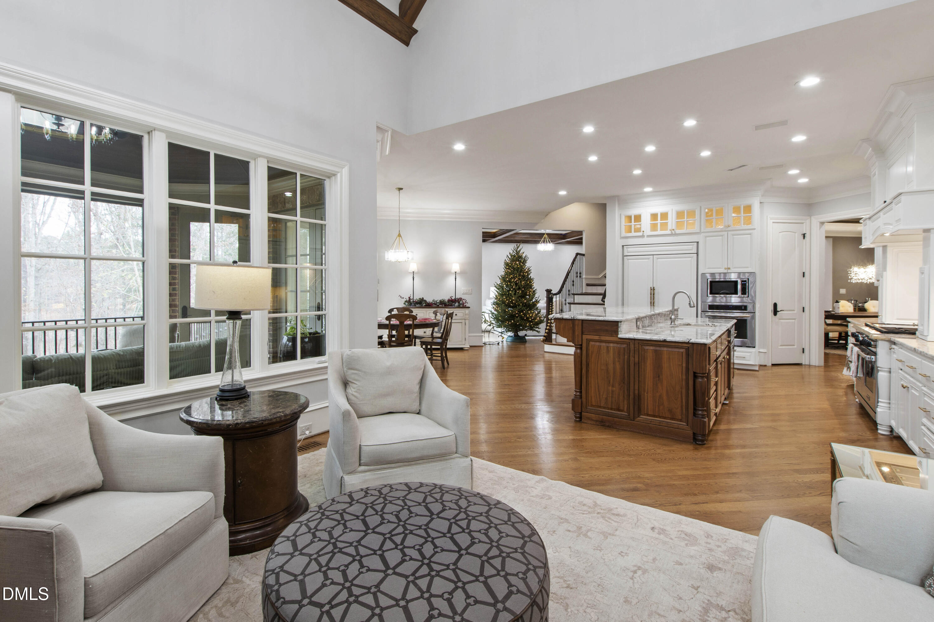 15508 Possum Track Road Raleigh, NC 27614 - Photo 36 of 85 a living room with fireplace furniture and a large window