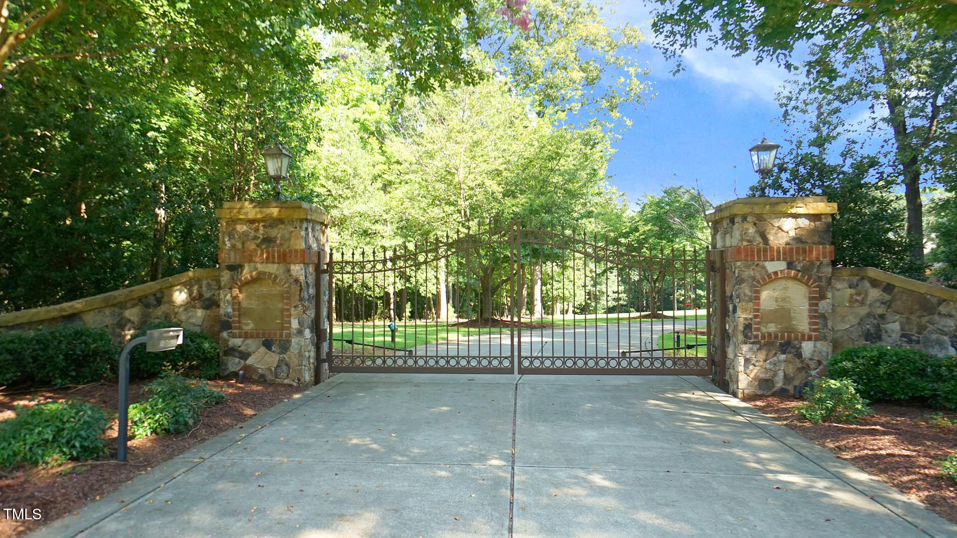 15508 Possum Track Road Raleigh, NC 27614 - Photo 4 of 85 a view of a house with a small yard and a large tree
