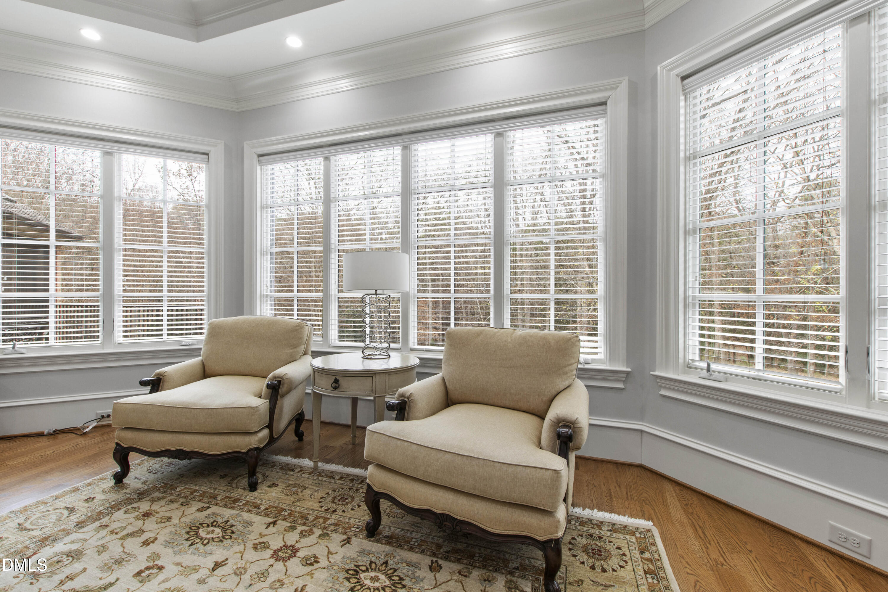 15508 Possum Track Road Raleigh, NC 27614 - Photo 42 of 85 a living room with furniture and floor to ceiling windows