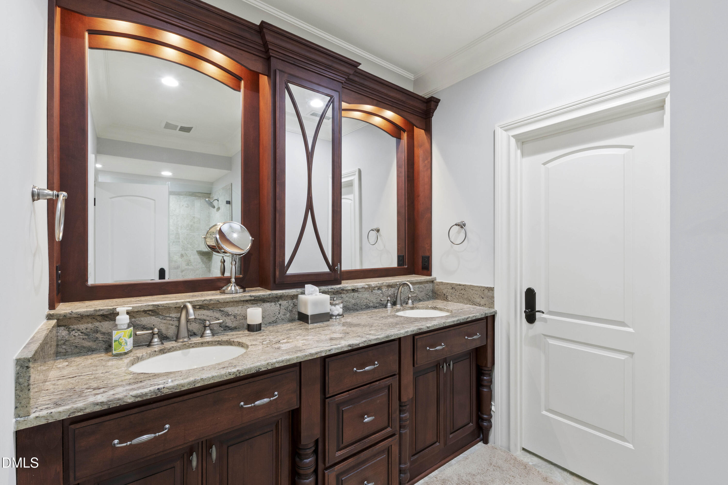 15508 Possum Track Road Raleigh, NC 27614 - Photo 53 of 85 a bathroom with a granite countertop sink and a mirror