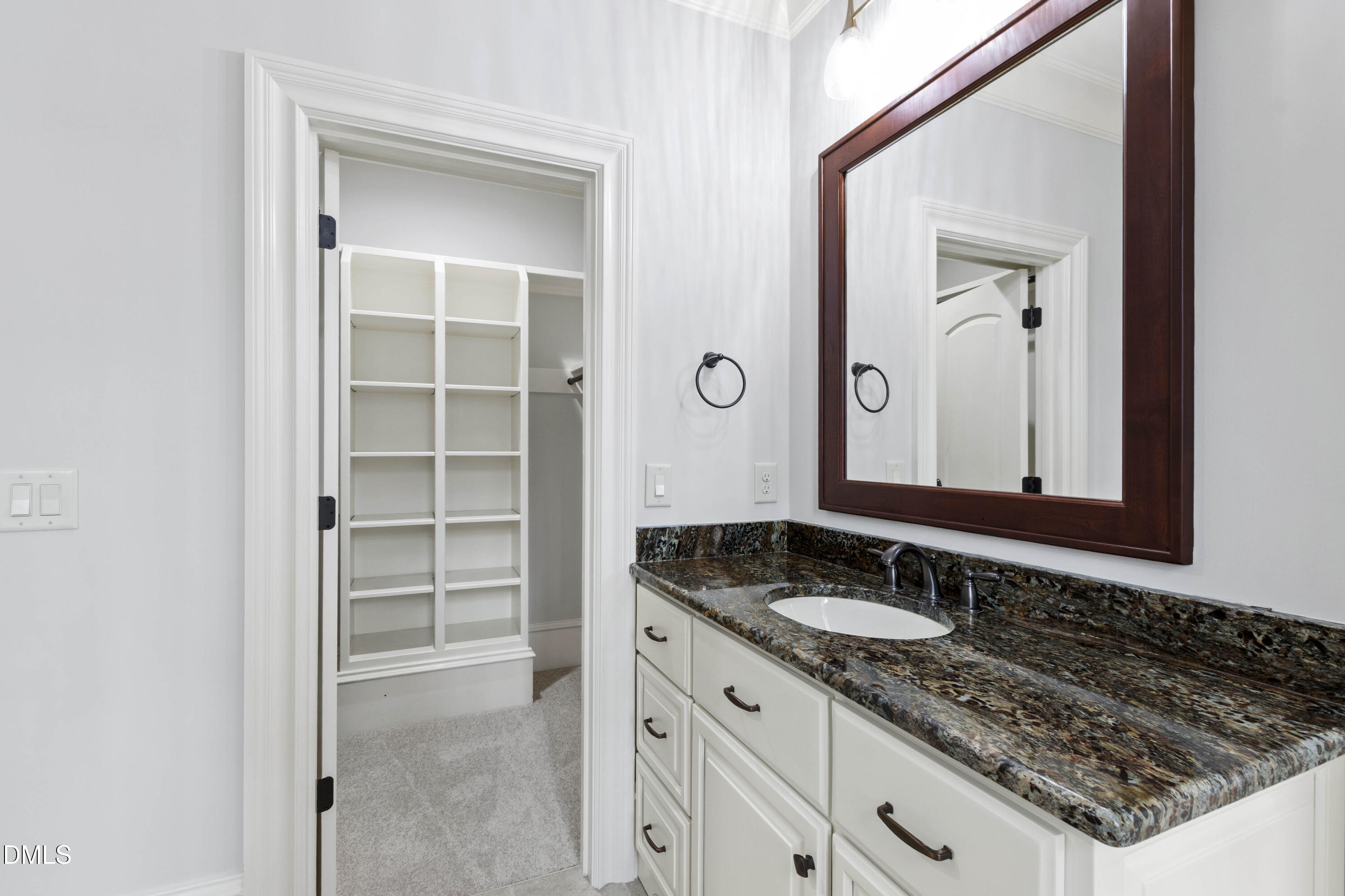 15508 Possum Track Road Raleigh, NC 27614 - Photo 57 of 85 a bathroom with a sink and a mirror