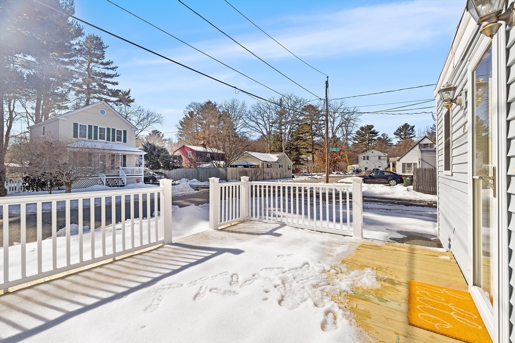 6 Sachem Road Norton, MA 02766 - Photo 18 of 25 a view of a porch with a floor to ceiling window