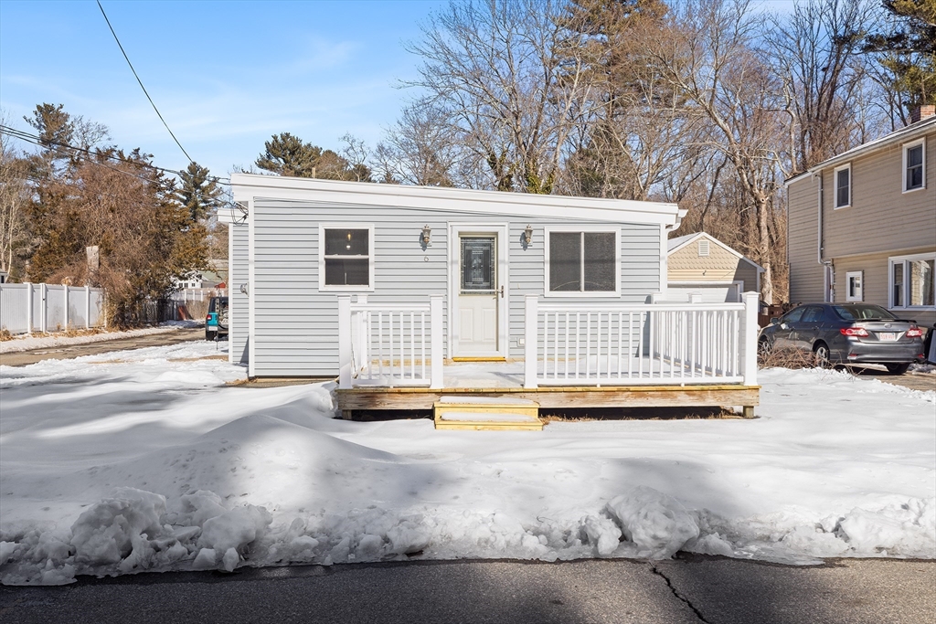 6 Sachem Road Norton, MA 02766 - Photo 21 of 25 a front view of a house with a yard