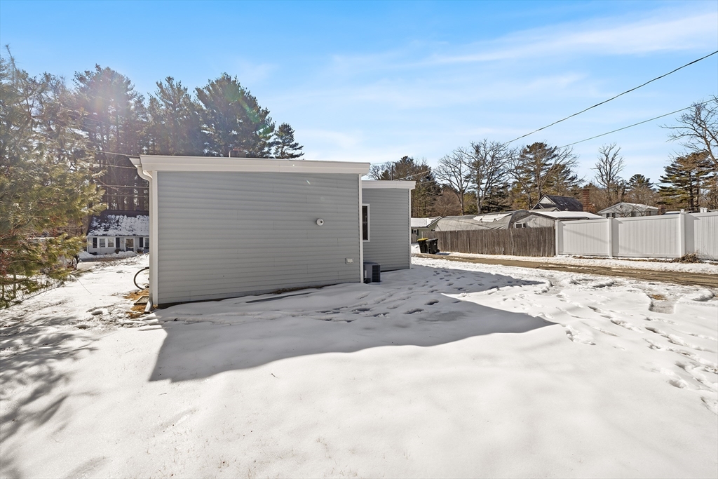 6 Sachem Road Norton, MA 02766 - Photo 24 of 25 a view of a backyard of snow