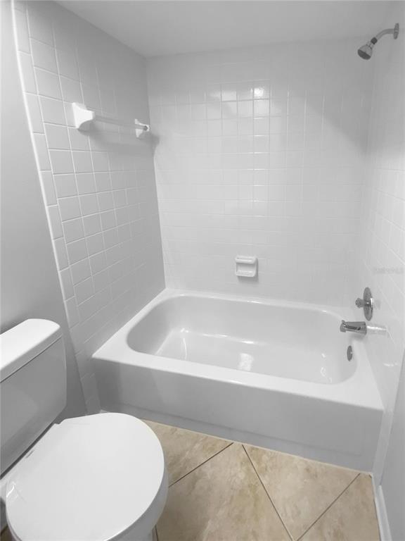 2131 Ridge Road South, Unit 80 Largo, FL 33778 - Photo 18 of 27 a bathroom with a bathtub and toilet