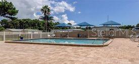 2131 Ridge Road South, Unit 80 Largo, FL 33778 - Photo 25 of 27 a view of a house with a yard