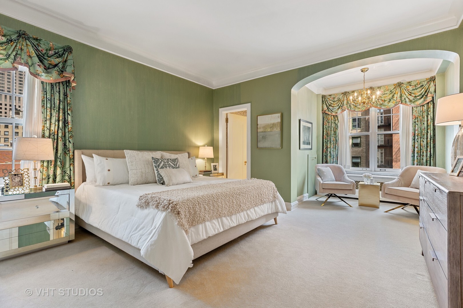 220 East Walton Place, Unit 9W Chicago, IL 60611 - Photo 10 of 19 a spacious bedroom with a bed and a large window