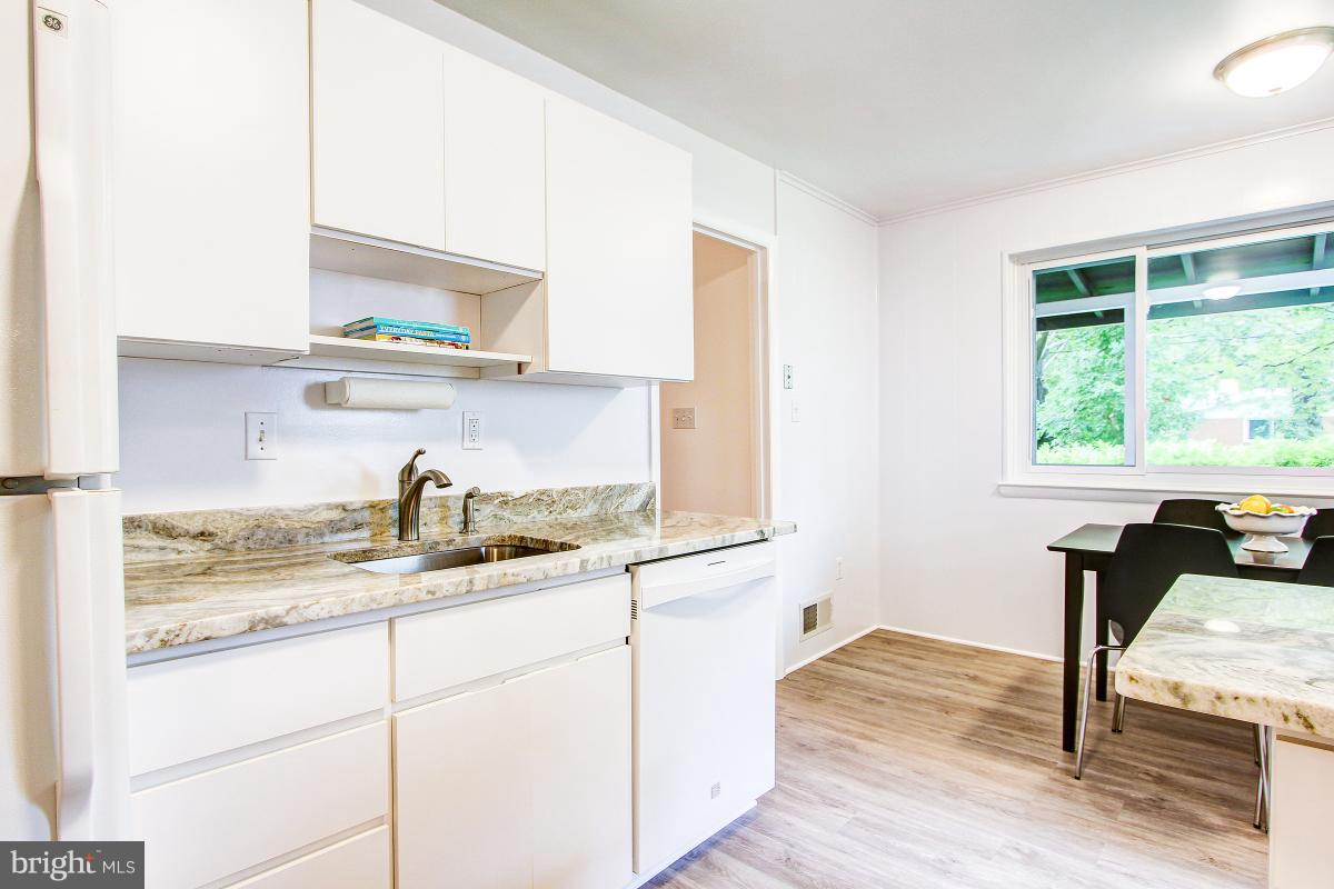 10822 Margate Road Silver Spring, MD 20901 - Photo 12 of 29 a kitchen with sink and window