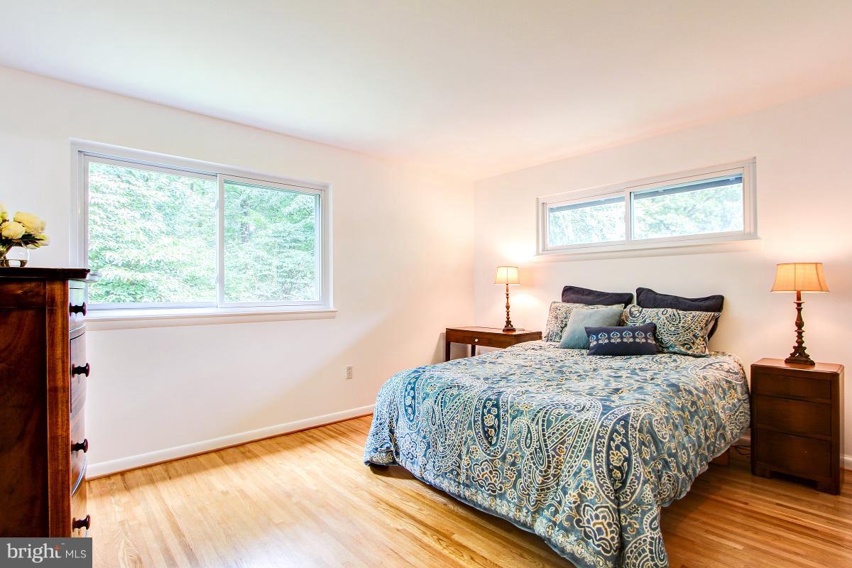 10822 Margate Road Silver Spring, MD 20901 - Photo 16 of 29 a bedroom with a bed and window