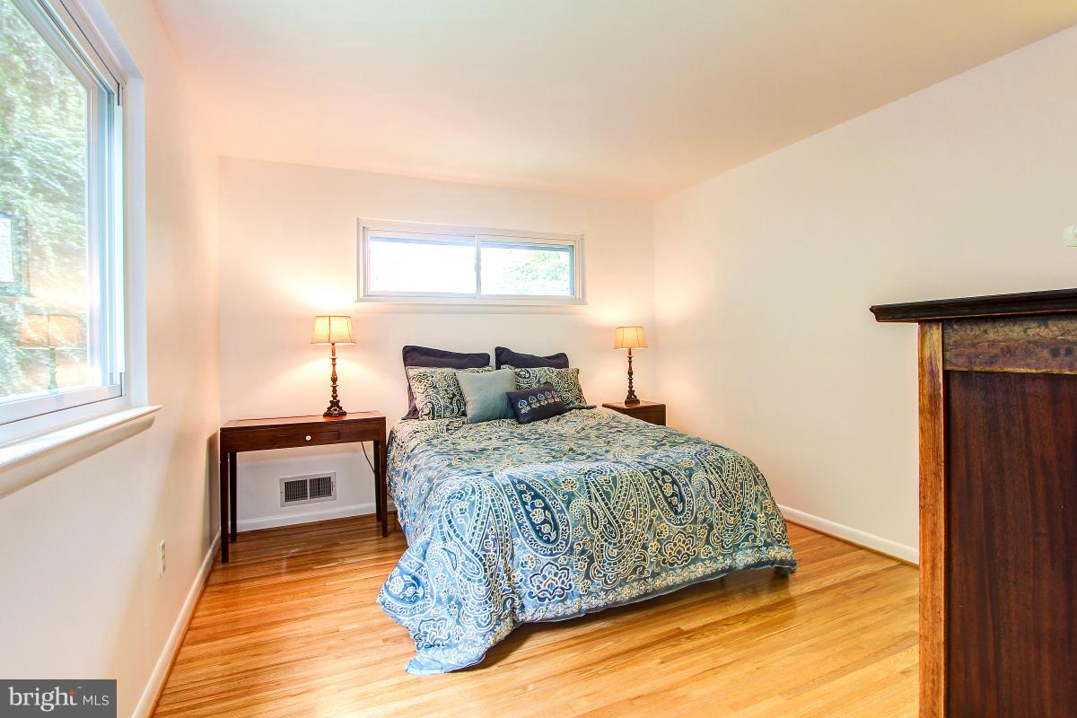 10822 Margate Road Silver Spring, MD 20901 - Photo 17 of 29 a bedroom with a bed and a window