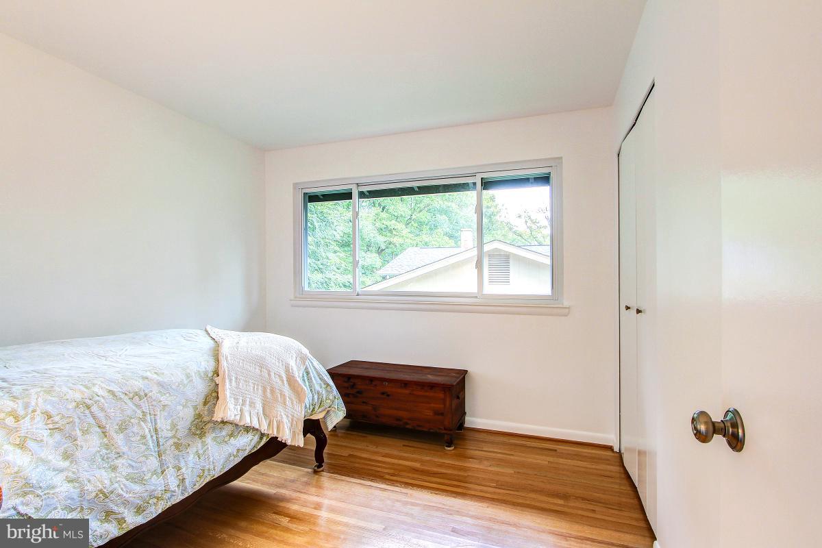 10822 Margate Road Silver Spring, MD 20901 - Photo 19 of 29 a bedroom with a bed and a window