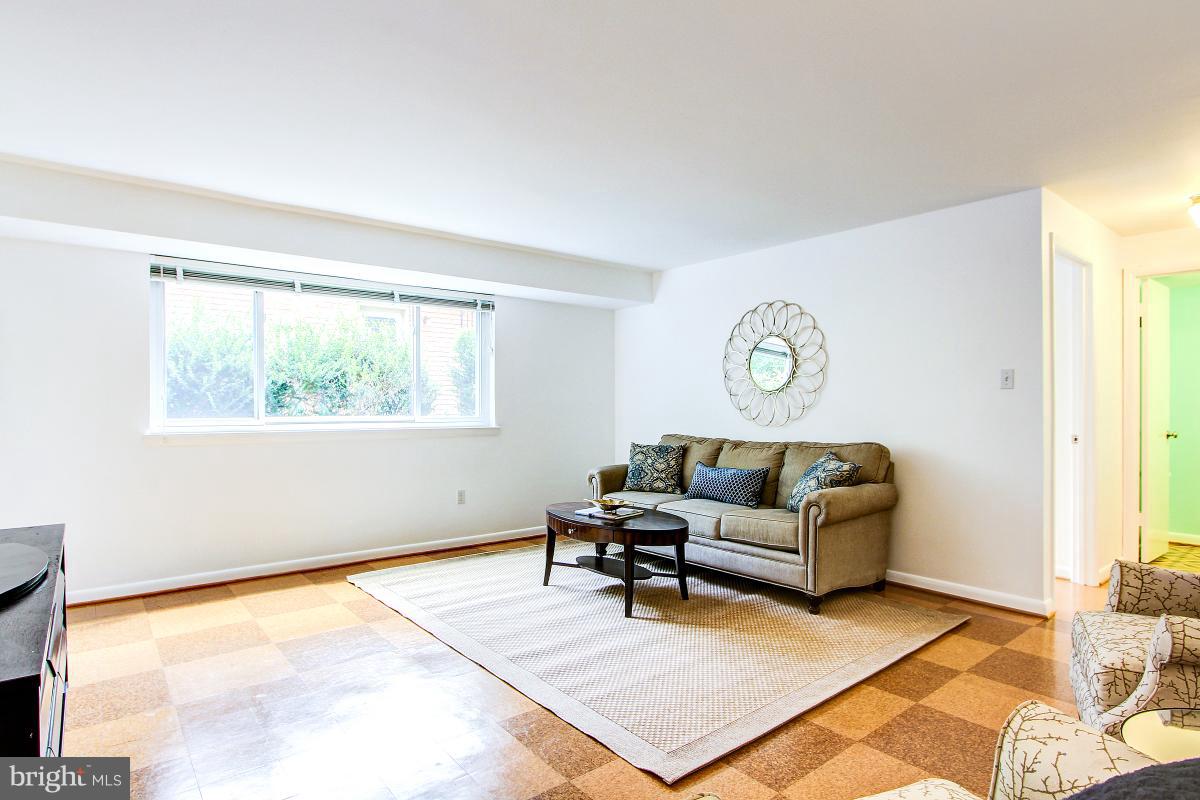 10822 Margate Road Silver Spring, MD 20901 - Photo 24 of 29 a living room with furniture and a window
