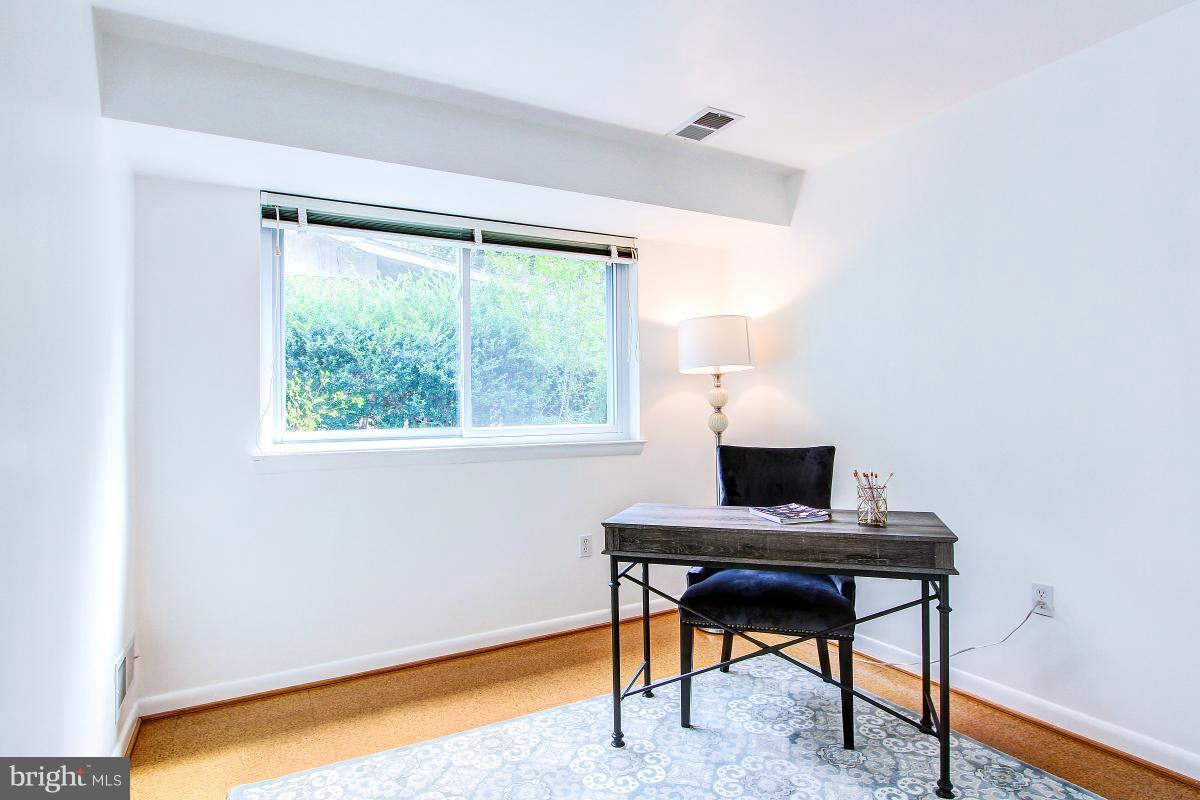 10822 Margate Road Silver Spring, MD 20901 - Photo 25 of 29 a workspace with furniture and a window