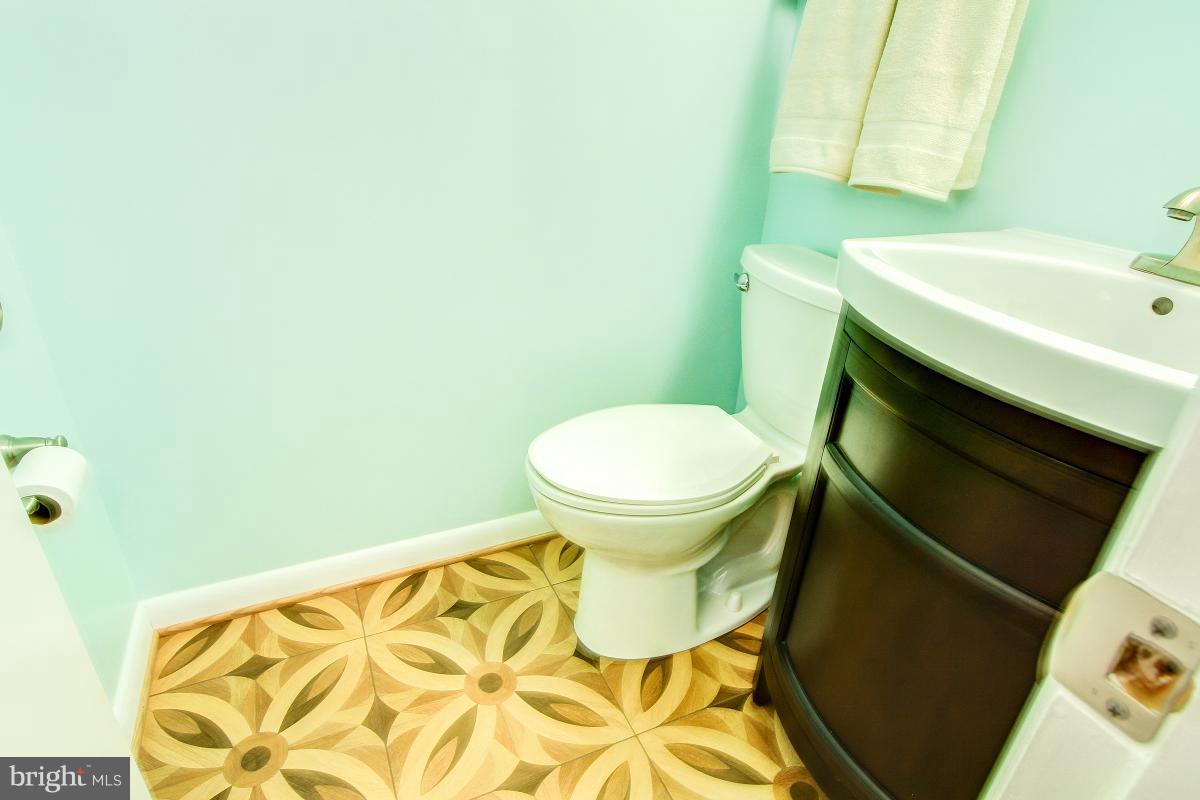 10822 Margate Road Silver Spring, MD 20901 - Photo 26 of 29 a bathroom with a sink and a toilet