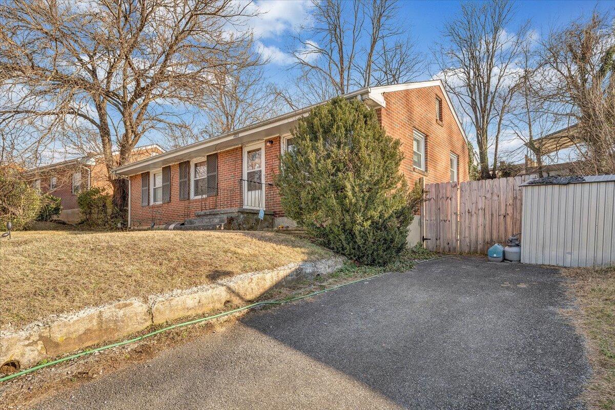 4928 Rowe Ridge Road Northwest Roanoke, VA 24017 - Photo 2 of 11 a view of a yard covered with snow in front of house